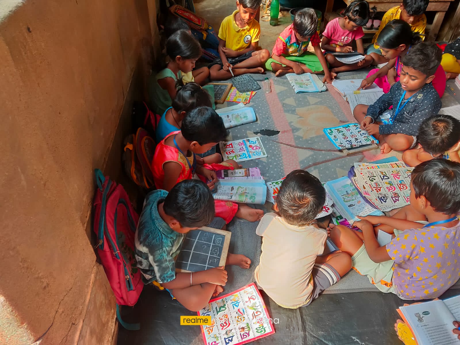 Children drawing and colouring together during a group activity